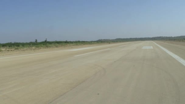 Dolly Left Empty Runway Tarmac Looking Horizon Parallax View — 비디오