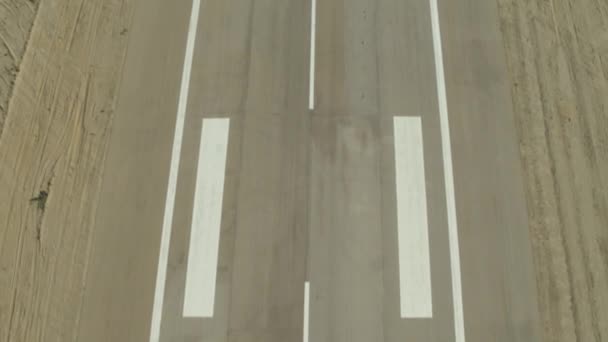 Aerial Empty Tarmac Airport Runway Tilt Dolly Forward — Stock Video