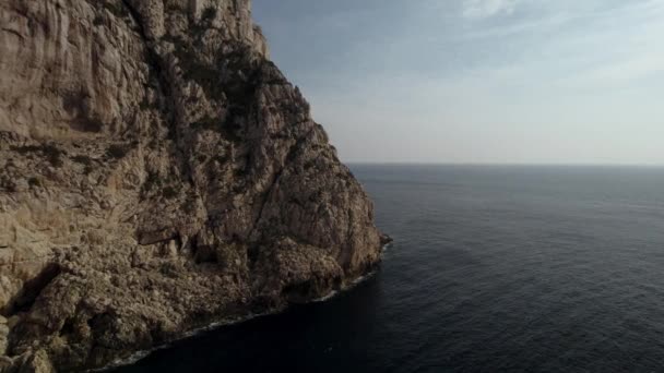 Aerial Shot Massive Cliffs Dark Calm Mediterranean Sea Surface — Stock Video