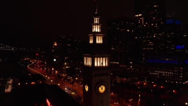 Aerial Parallax Shot San Francisco Clocktower Bay Bridge Background Night — Stock Video