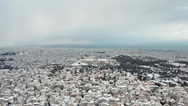 Athens City Covered Snow Slowly Flying Acropolis Monument Aerial Panorama — Stock Video