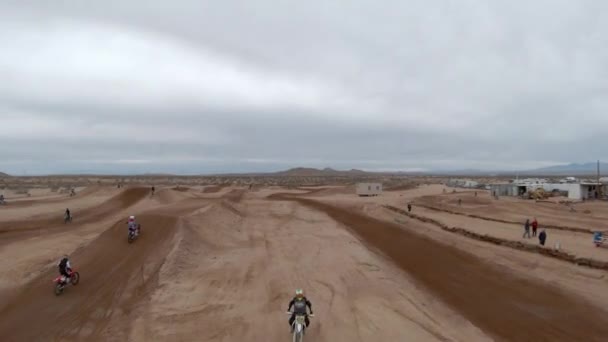Motorcycles Taking Long Jumps Motocross Racetrack Mojave Desert Aerial View — Stock Video