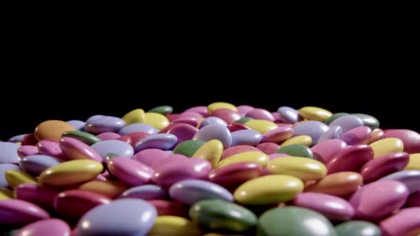 Tracking Rotating Shot Multi Coloured Chocolate Sweets — Stock Video