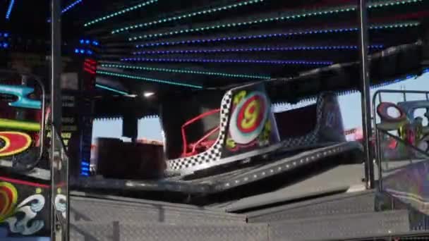 Brightly Coloured Flashing Spinning Ride Funfair — Stock Video