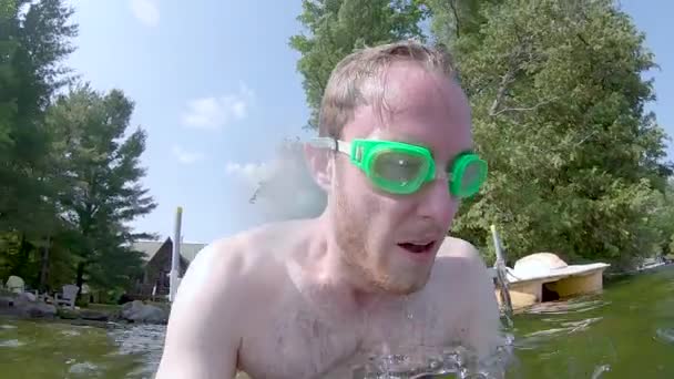 Young Man Dives Underwater Goes Swim Lake — Stock Video