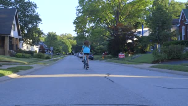 Teen Girl Rides Street Suburbs Summer Evening Away Camera — Stock Video