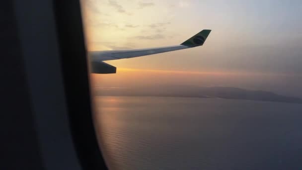 Airplane Brazillian Flag Tip Flying Ocean Window Shot — Stock Video
