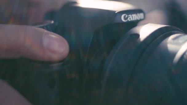 Close-up of Canon Logo on Lens