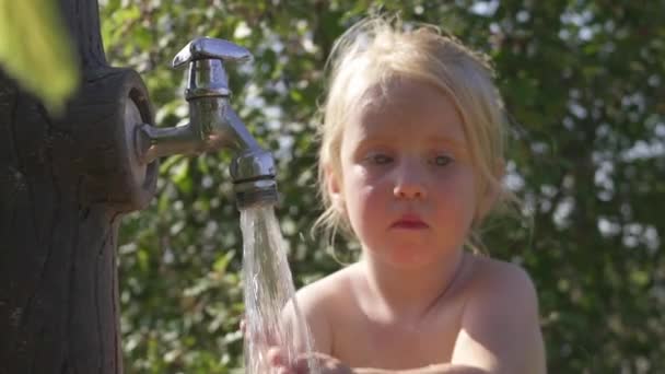 Blonde Year Old Girl Washing Face Water Tap Garden Focus — Stock Video