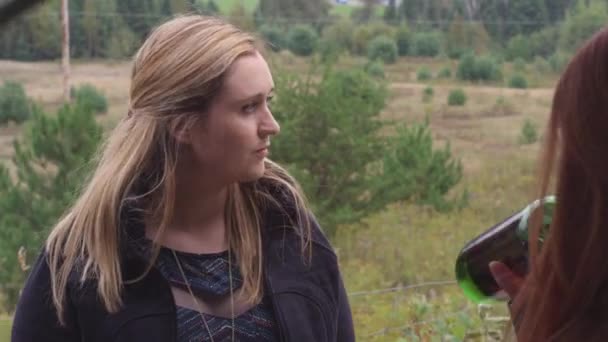 Group Women Stand Outdoors One Shoves Her Friend Out Way — Stock Video