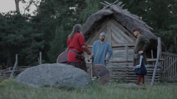 Viking Age Village Reenactment Vikings Socializing Practicing Swords — Stock Video