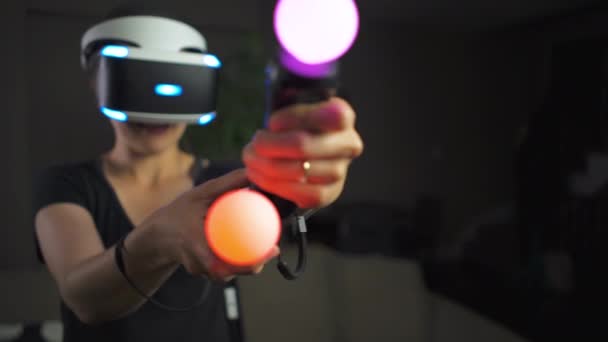 Woman Playing Virtual Reality Living Room Aiming Controllers Gun — Stock Video