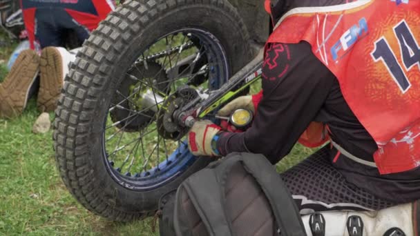 Rider Fixing His Dirt Bike Out Field — Stock Video