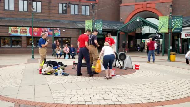 Fire Men Women Charity Outdoor Rowing Machine Event Public — Stock Video