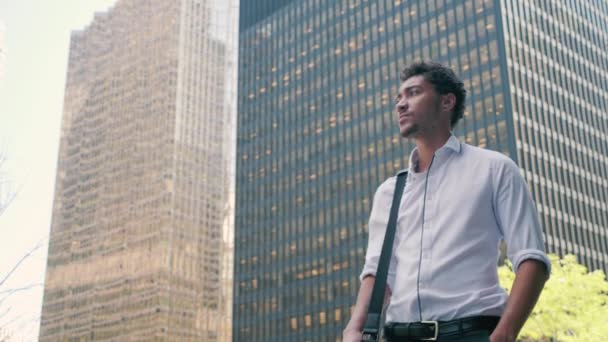 Attractive Racial Professional Carrying Laptop Bag Walks Stops Look Surrounding — Stock Video