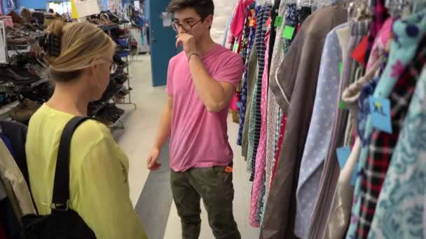 Mother Teen Son Inspect Pair Pants Boy Trying Size Fit — Stock Video