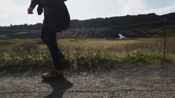 Guy Walking Legs Seen Side Gimbal Shot Thingvellir National Park — Stock Video