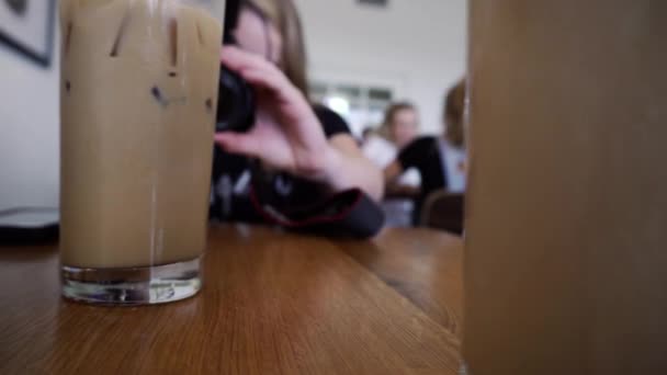 Woman Using Camera Front Two Iced Coffees — Stock Video