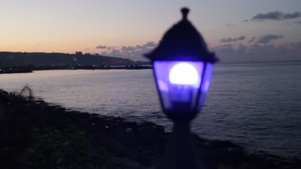 B roll (beauty shot) of a public light in Trabzon in Turkey with sea shore at the sunset time.This video works great with travel videos and documentaries.
