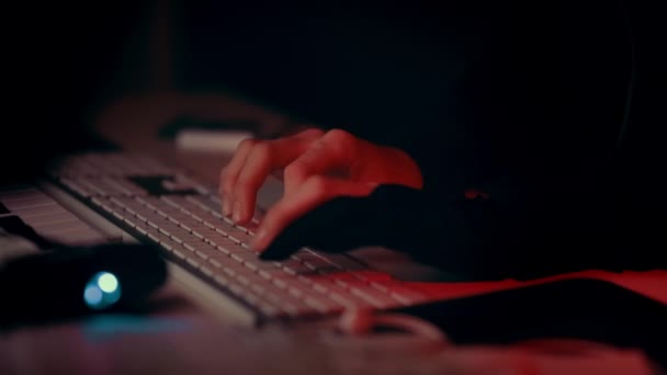 Hacker Hands Meticulously Hacking Darkness Cast Red Light Blinking White — Stock Video