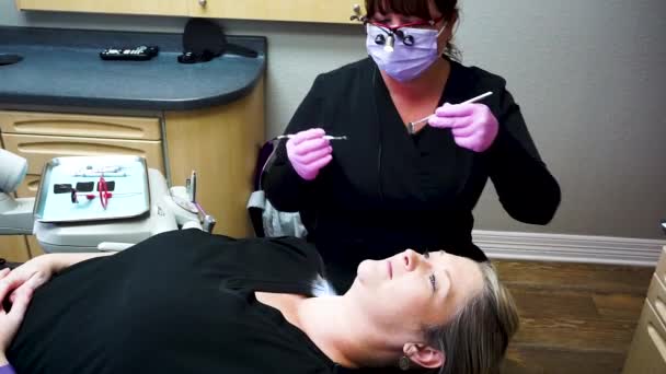 Dental Office Visit Female Patient Hygienist Oral Examination — Stock Video