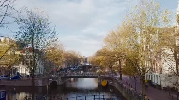 Amsterdam Canal Bridge Drone Flyover Fall Sunny Day — Stock Video