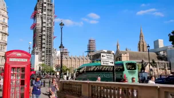 Time Lapse Videó Westminsterben Big Bennel Háttérben Egy Piros Telefonfülkével — Stock videók