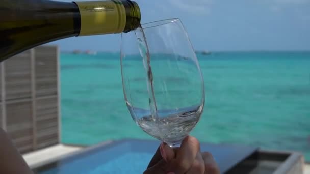 Pouring White Wine Overwater Bungalow Maldives Fairmont Resort — Stock Video