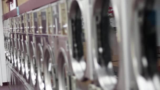 Laundromat Dryers Come Focus — Stock Video