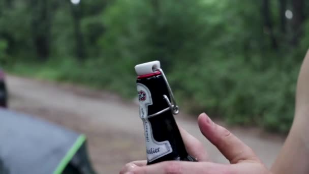 German Beer Being Popped Open Spilling Nature Camping Close Top — Stock Video
