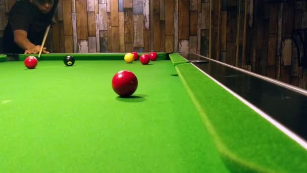 Man Black Shirt Hat Playing Billiard Game Red Yellow Balls — Stock Video