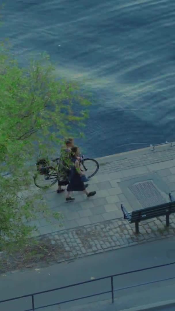 Aerial Panning Shot Two Women Walking Coast Stockholm Sweden Rolling — стокове відео