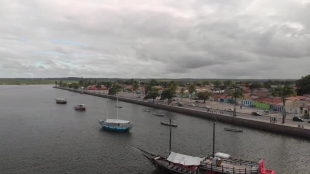 Cinematic Aerial Flythrough Boats Bay Downtown Porto Seguro Brazil — стоковое видео