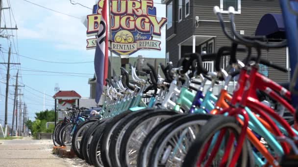 People Leaving Bike Rental Shop — Stock Video