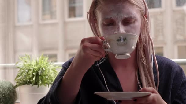 Girl Face Mask Drinking Tea Slow Motion — Stock Video