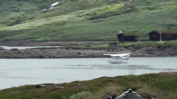 Vliegtuig Landing Bygdin Lake Eidsbugarden Noorwegen — Stockvideo