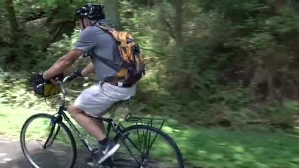 Closeup Elderly Gentleman Biking Forest Area — Stock Video