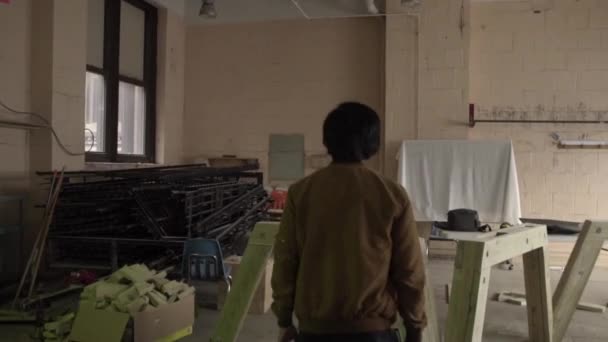 Trendy Artist Walking Exploring Workshop Industrial Concrete Building — Stock video