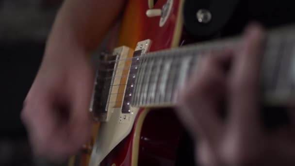 Man Strumming Power Chords His Les Paul Style Guitar Close — Vídeo de Stock