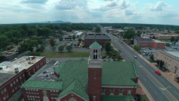 Aerial View Downtown Small City While Orbiting Church — Stock Video