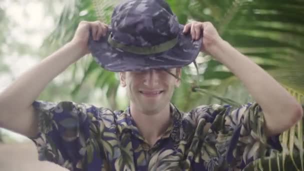 Attractive Young White Male Explorer Outfit Puts His Wide Brim — Stock Video