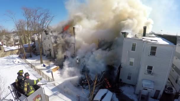 Aerial View Two Firemen Spraying Water House Fire Winter — Stock Video