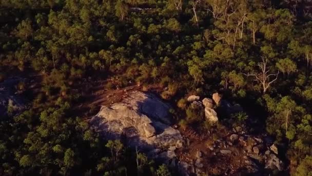 Aerial Pull Back Rock Outcrop Australian Bush Hillside — Stock Video