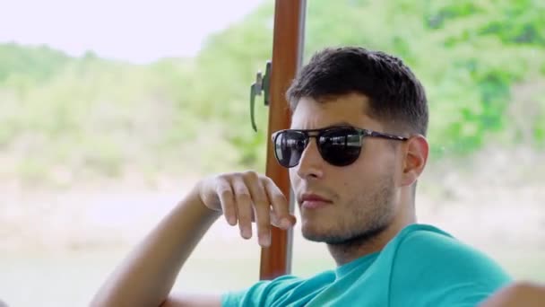 Attractive Millennial Man Notices Something Someone Room Takes Sunglasses — Stock Video