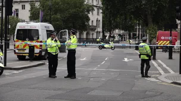 August 2018 Police Officers Stand Guarding Crime Scene Cordon Car — Stock Video