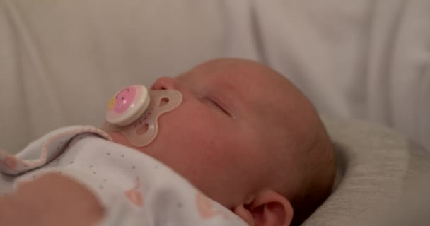 Baby Sleeping Occasionally Sucking Pacifier — Stock Video