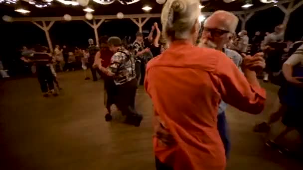 Closeup Senior Couple Swing Dancing Night Festive Open Air Pavilion — Stock Video