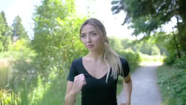 View Woman Face She Begins Jogging Wooded Area Pond Her — Stock Video