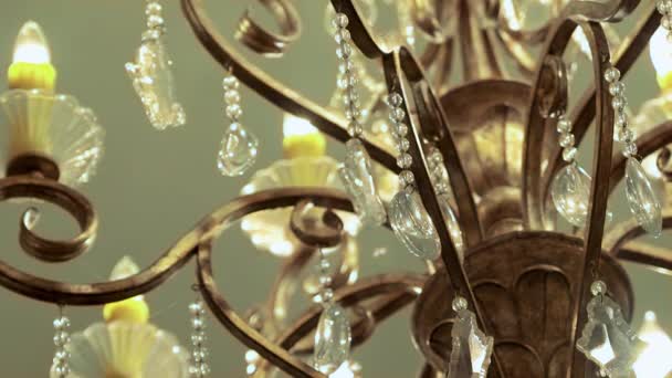 Close up of a Elegant chandelier at a wedding reception venue in slow motion