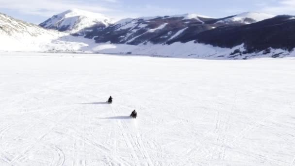 Drone Flying Group Friends Having Fun Snowmobile — Stok Video